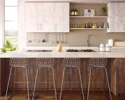 four gray bar stools in front of kitchen countertop